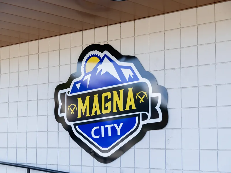 Magna City seal on a city building
