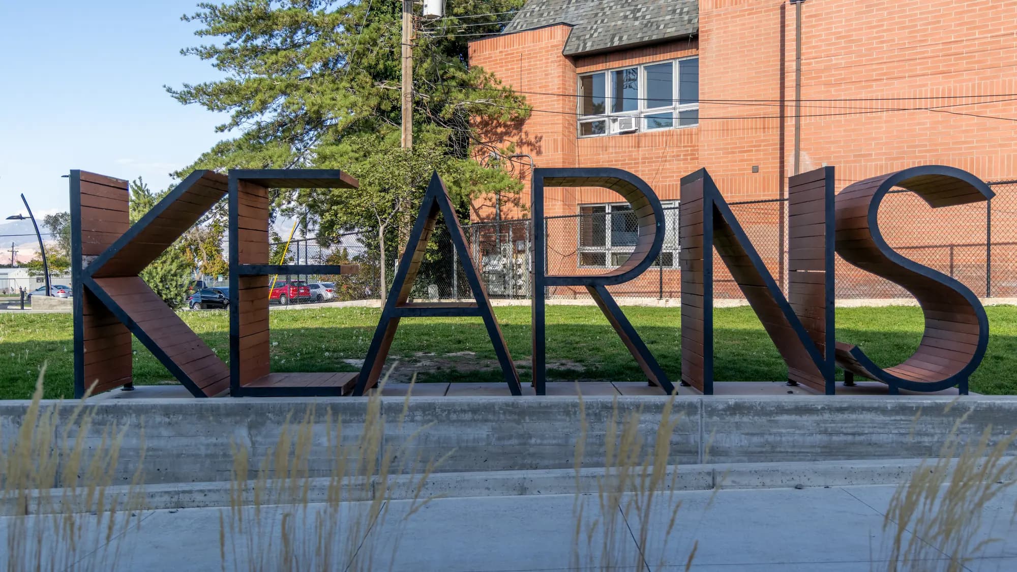KEARNS lettering in front of a brick building