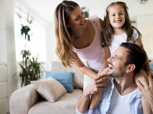 Young family having fun in their Bountiful home